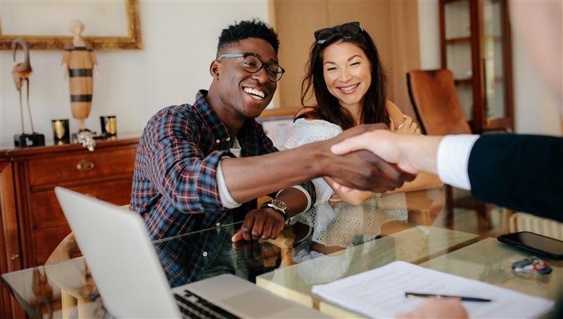 Homeowners shaking hands